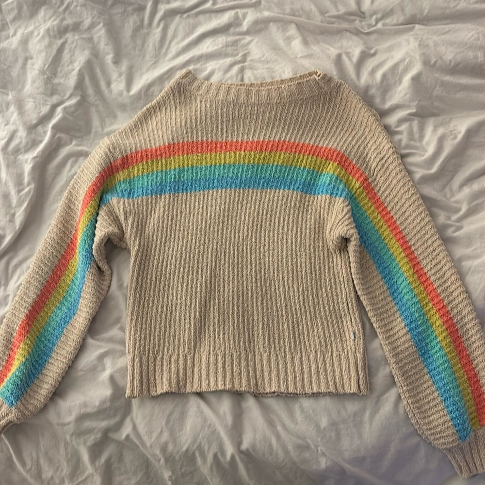 sweater with rainbow on front and sleeves